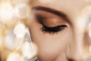 Woman face with beautiful makeup Close up of woman face with eye makeup