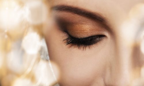 Close up of woman face with eye makeup
